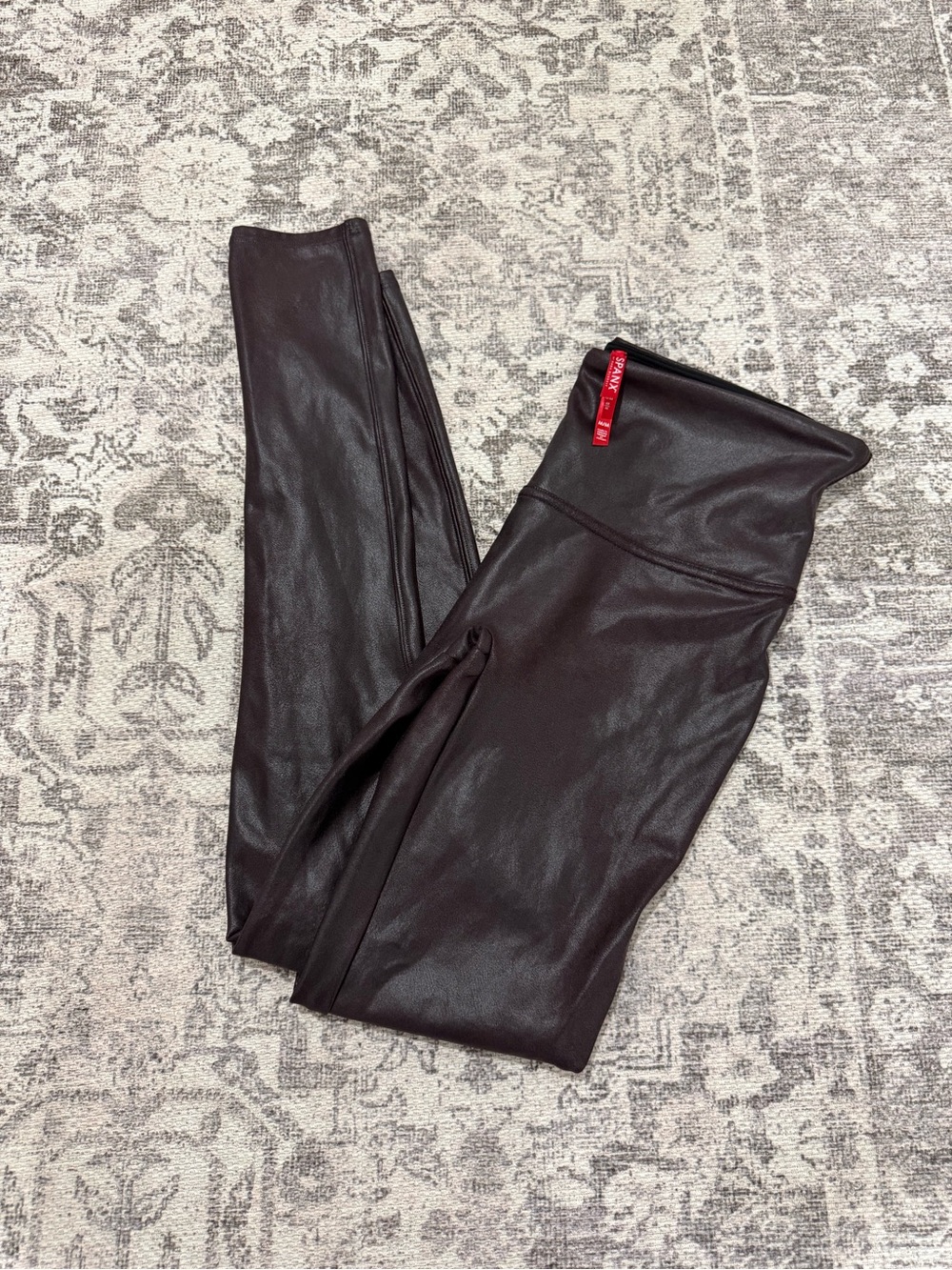 SPANX Shape Faux Leather Leggings-deep wine/burgundy colorway.